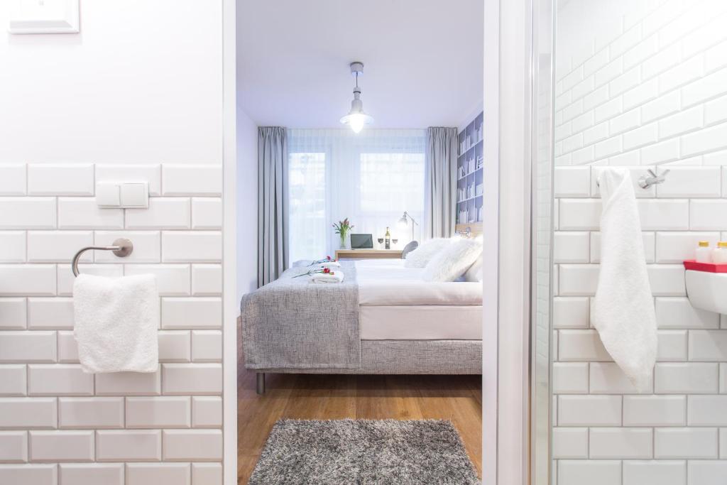 Posteľ alebo postele v izbe v ubytovaní Smart Hotel