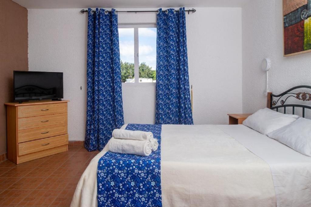 Postel nebo postele na pokoji v ubytování Chez Pepe Apartments