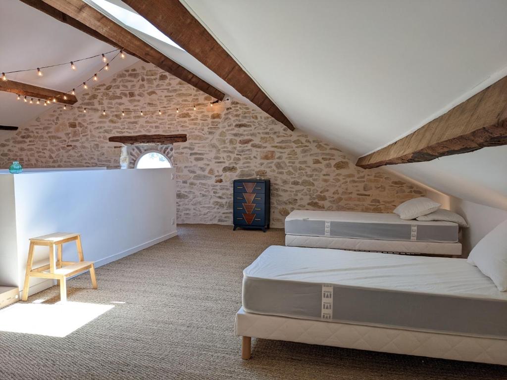 Posteľ alebo postele v izbe v ubytovaní Le vieux tilleul