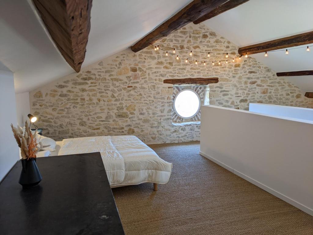 Posteľ alebo postele v izbe v ubytovaní Le vieux tilleul