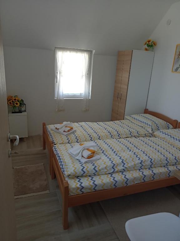 Postel nebo postele na pokoji v ubytování Vila Danida