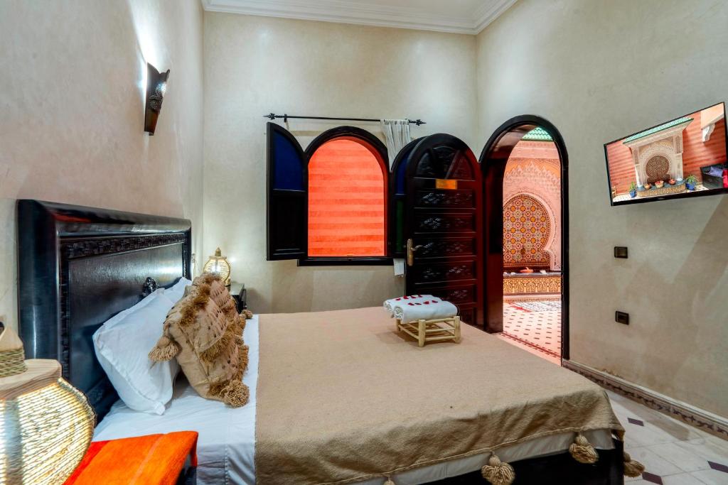 Postel nebo postele na pokoji v ubytování Riad Haj Thami
