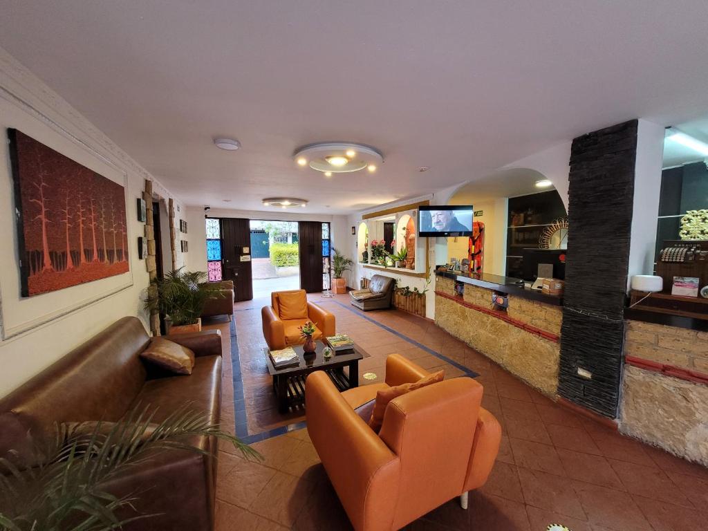 TV a/nebo společenská místnost v ubytování Hotel Cemandy by MA