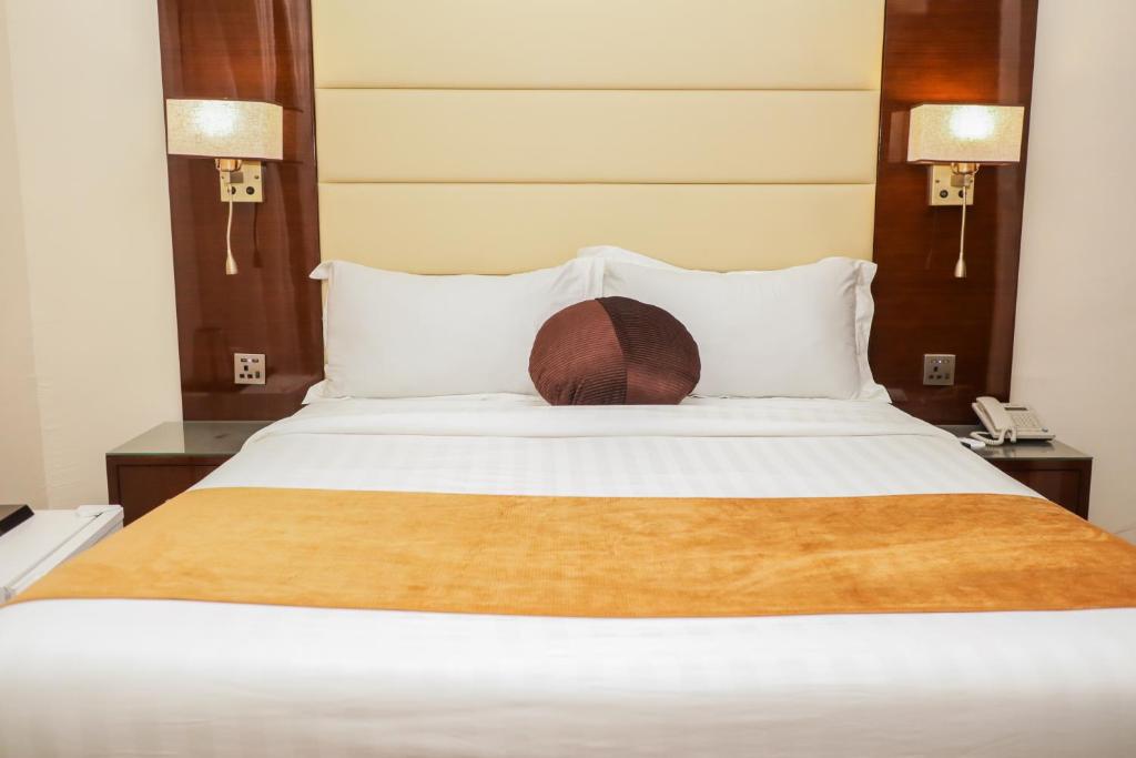 Postel nebo postele na pokoji v ubytování De Rembrandt Classic Hotel