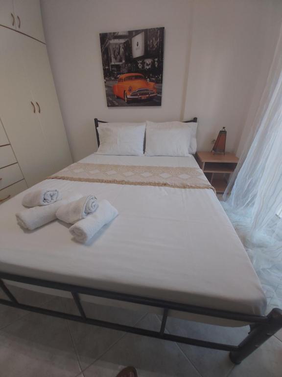 Posteľ alebo postele v izbe v ubytovaní Kali View Apartment
