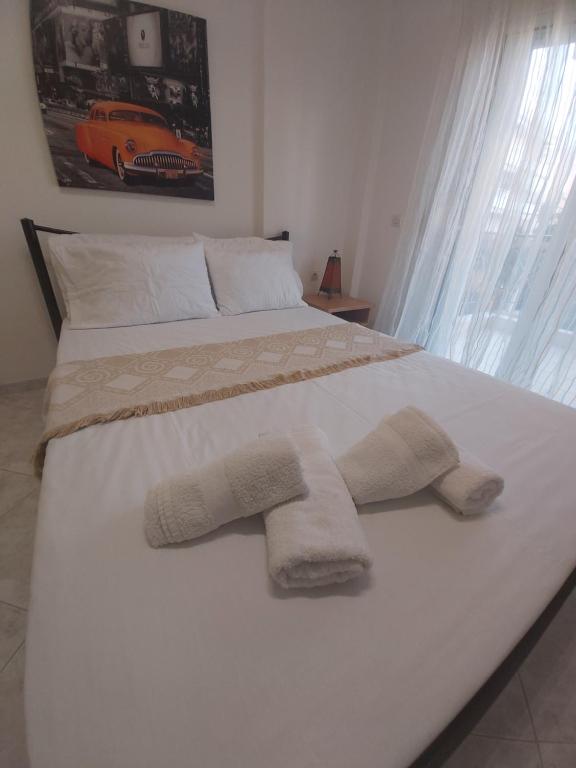 Posteľ alebo postele v izbe v ubytovaní Kali View Apartment