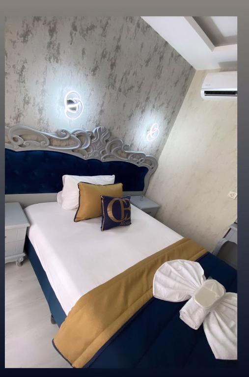 Postel nebo postele na pokoji v ubytování BALPETEK HOTEL