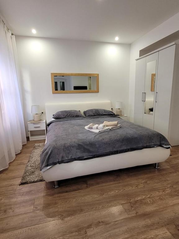 Postel nebo postele na pokoji v ubytování Sebenico Luxury Rooms