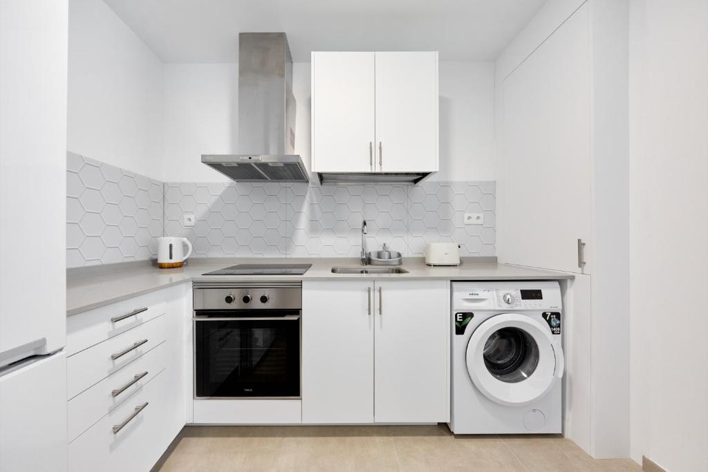 Kuchyň nebo kuchyňský kout v ubytování Sonrisa Deluxe Apartments, Levante