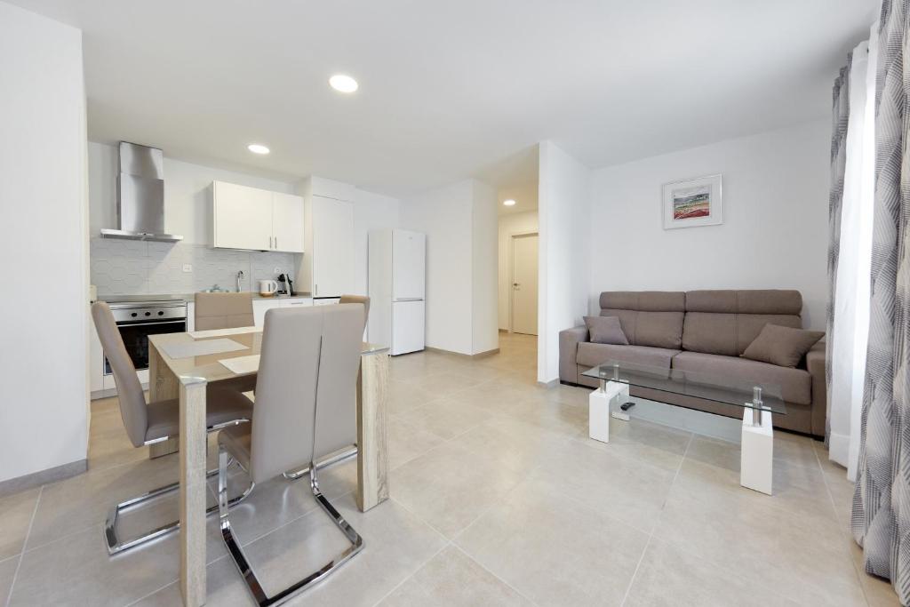 Kuchyň nebo kuchyňský kout v ubytování Sonrisa Deluxe Apartments, Levante