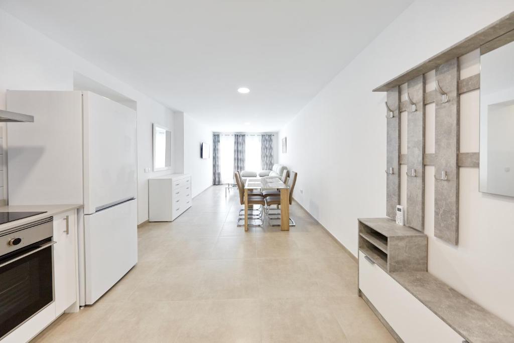 Kuchyň nebo kuchyňský kout v ubytování Sonrisa Deluxe Apartments, Levante
