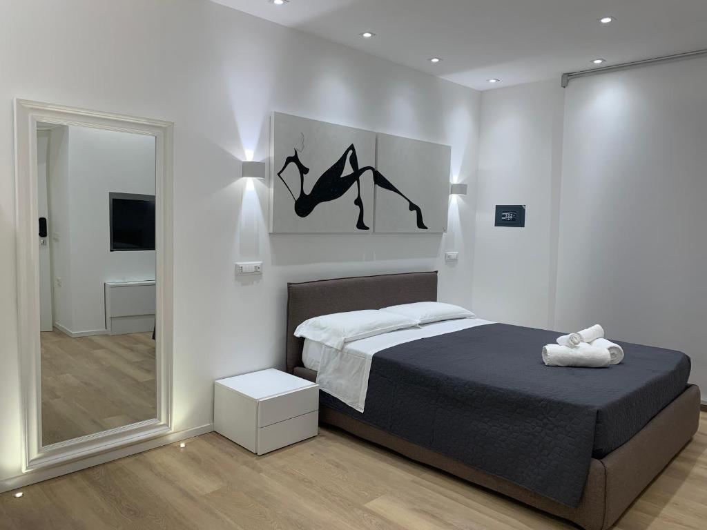 Postel nebo postele na pokoji v ubytování ABBA ROOMS