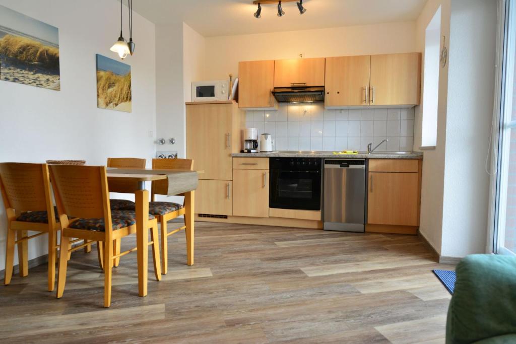 Kuchyň nebo kuchyňský kout v ubytování Haus Nordseebrandung NB26