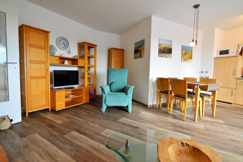TV a/nebo společenská místnost v ubytování Haus Nordseebrandung NB26