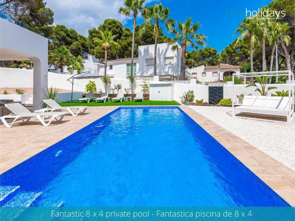 Swimmingpoolen hos eller tæt på Villa Milana by HMR Holidays