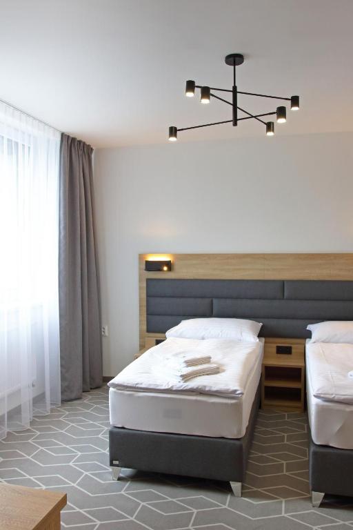 Posteľ alebo postele v izbe v ubytovaní Typton hotel&spa