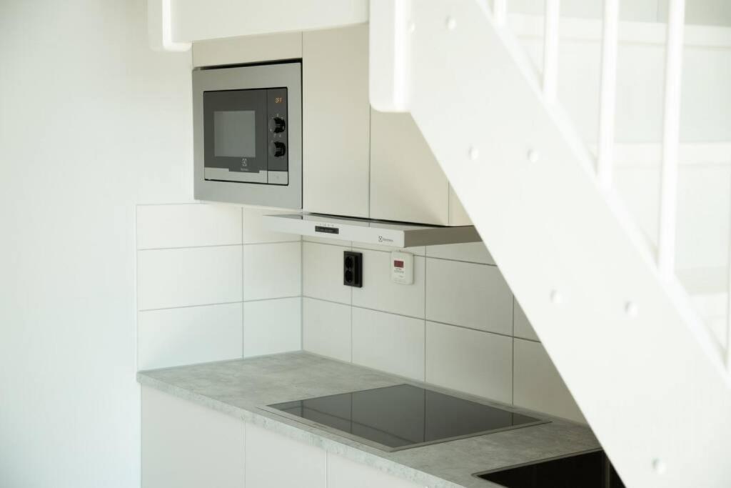 Kuchyň nebo kuchyňský kout v ubytování SK67 Modern and bright Loft with free Parking