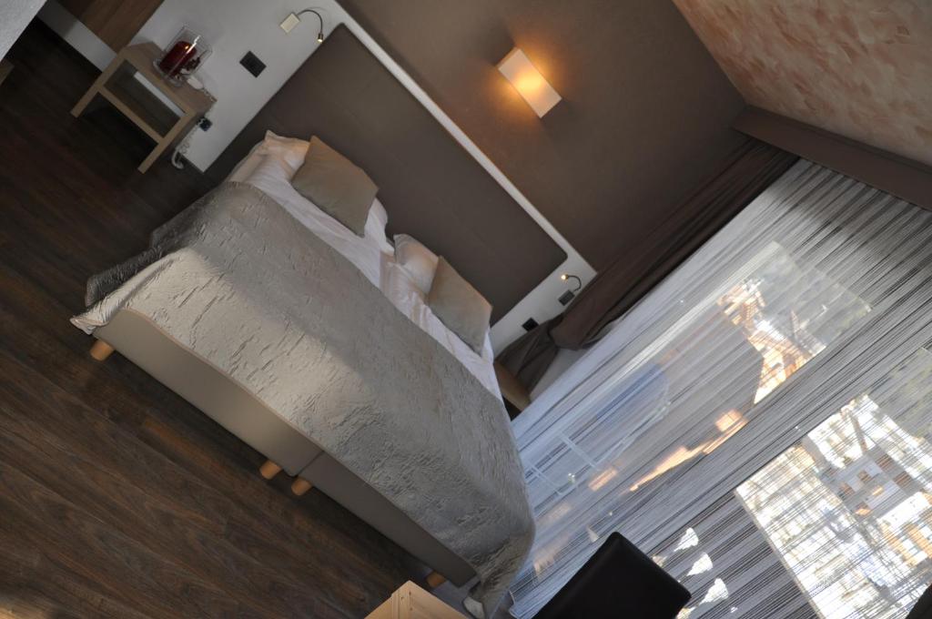 Letto o letti in una camera di Residence Anda