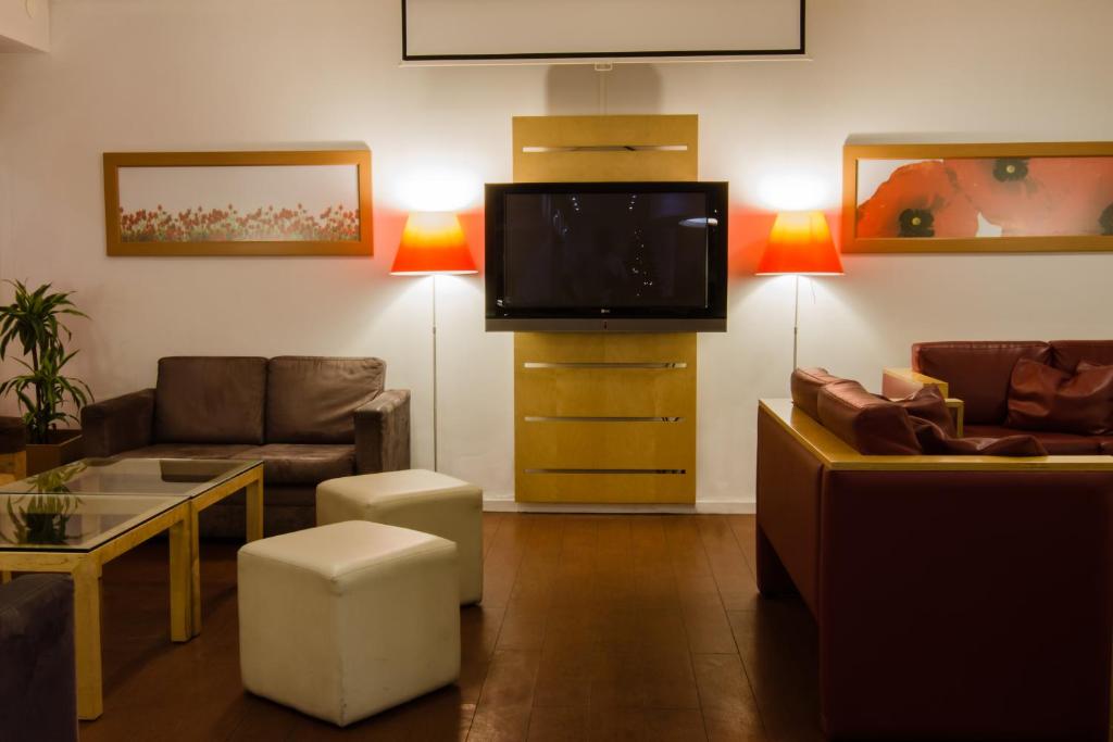 TV a/nebo společenská místnost v ubytování Hotel ibis Porto Sao Joao