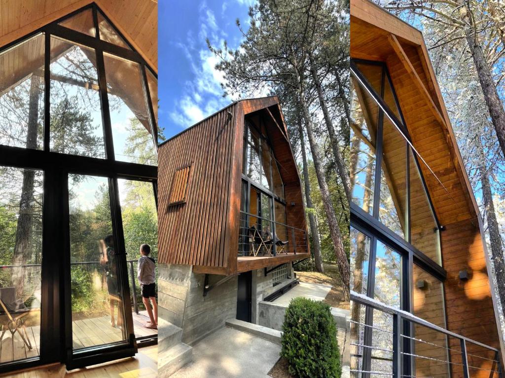 a tree house with a balcony and large windows at National Park Sauna Retreats - Villa 68 Pines in Kaludjerske Bare