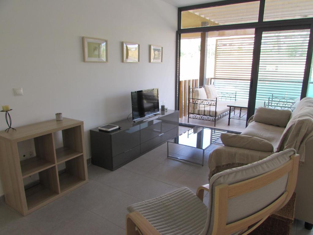 Posezení v ubytování GOLF RESORT APARTMENT