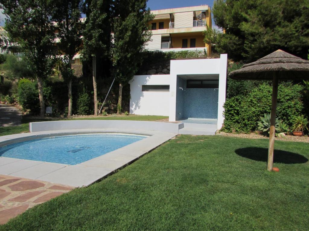 Bazén v ubytování GOLF RESORT APARTMENT nebo v jeho okolí
