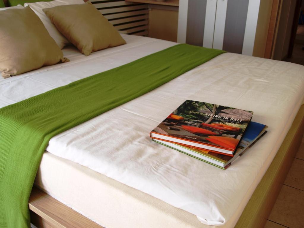 Postel nebo postele na pokoji v ubytování Svea Hotel