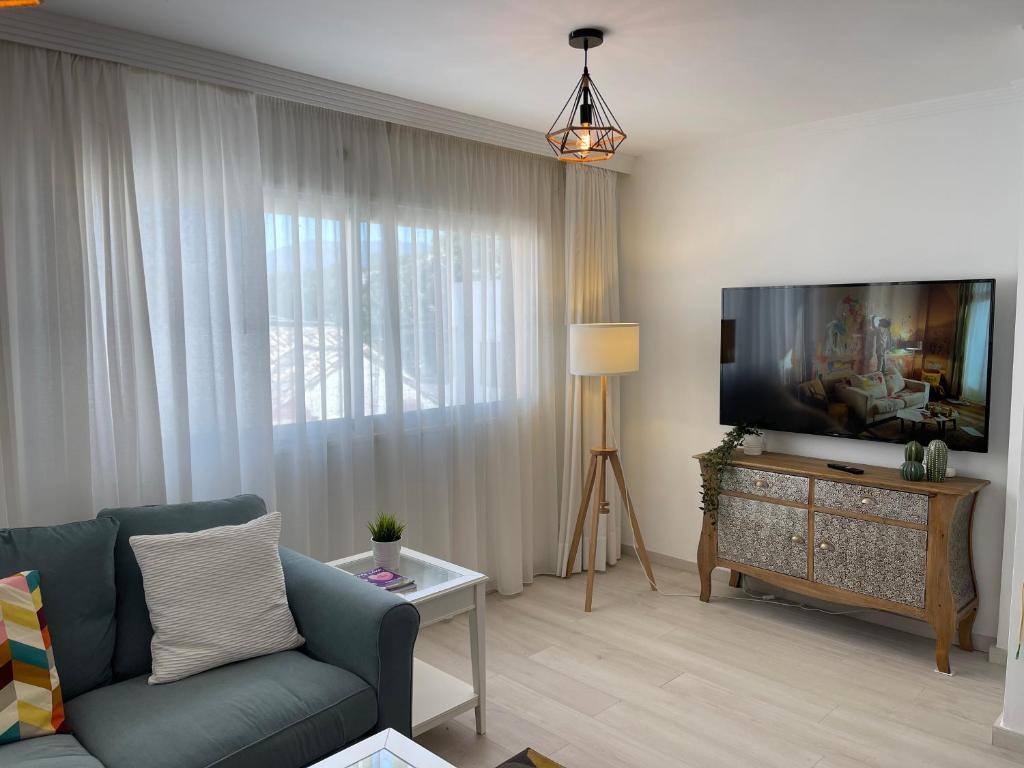 Televízia a/alebo spoločenská miestnosť v ubytovaní La Cala Holiday Retreat