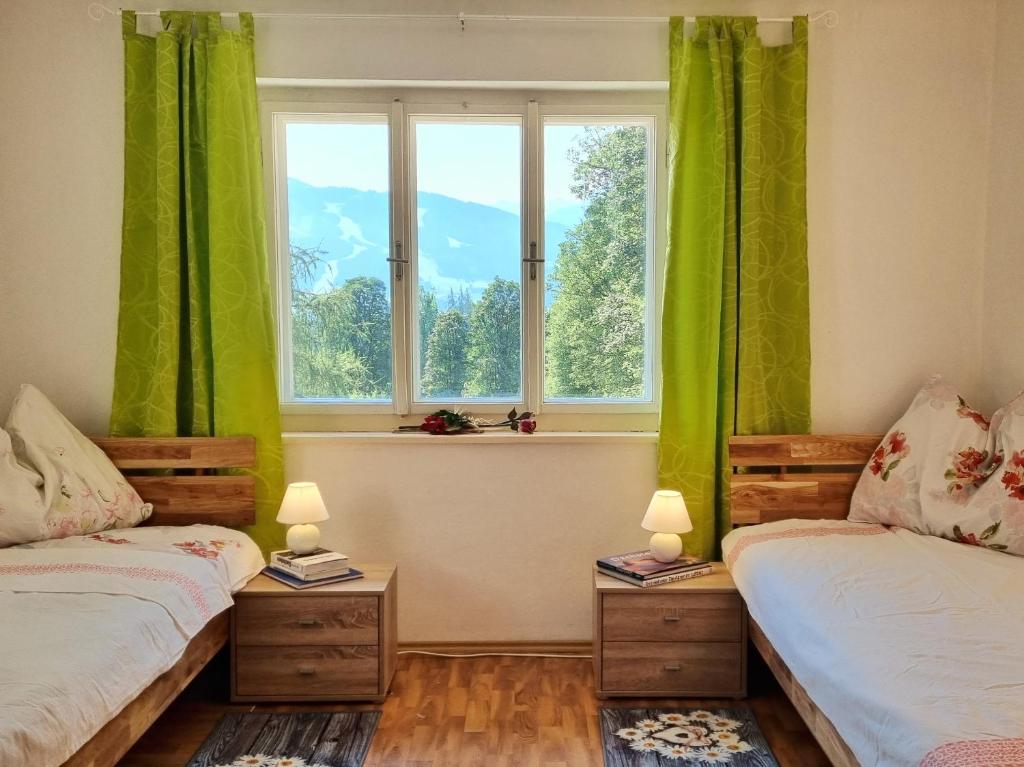 Posteľ alebo postele v izbe v ubytovaní Strasser´s Mountain Home