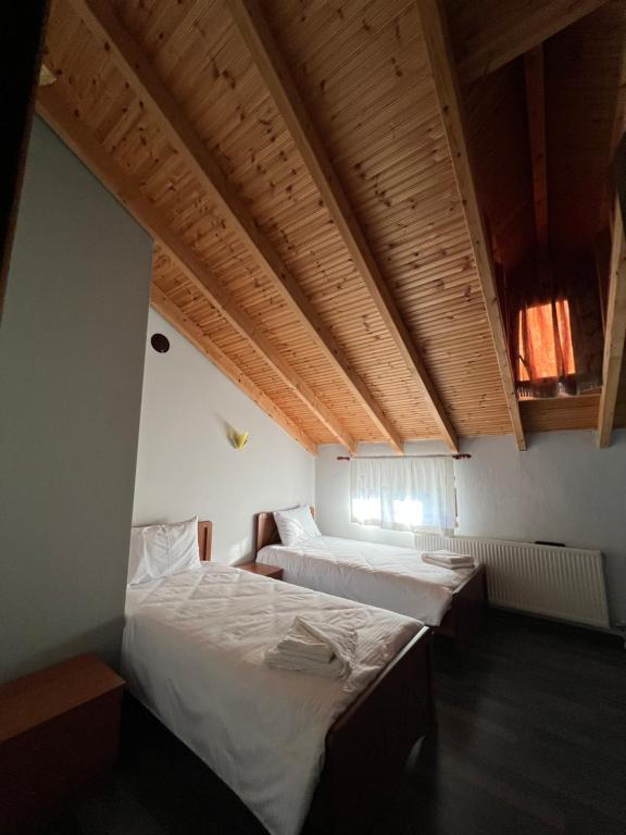 Postel nebo postele na pokoji v ubytování Vila Mata