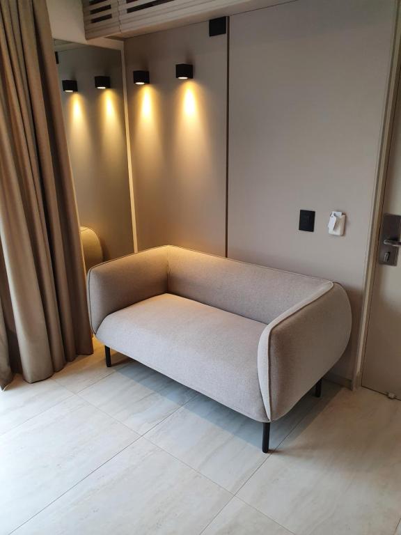 Postel nebo postele na pokoji v ubytování Lastarria Hotel