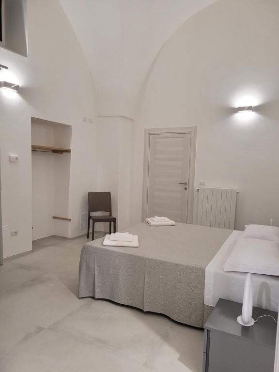 Postel nebo postele na pokoji v ubytování Le dimore del salento appartamento 1