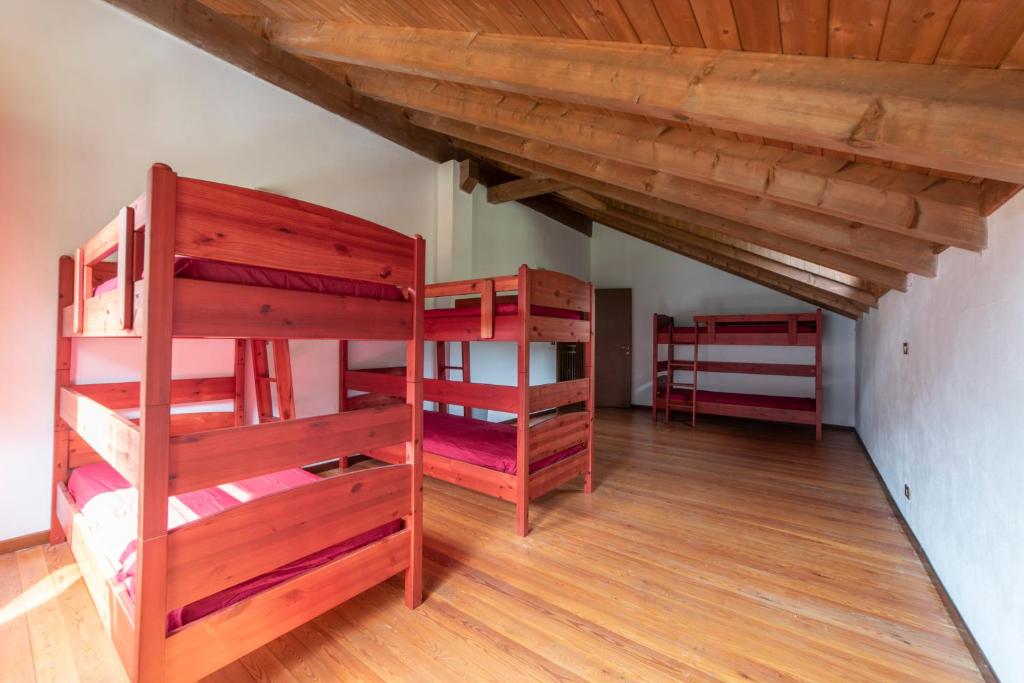 Postel nebo postele na pokoji v ubytování Rifugio Parpinasca