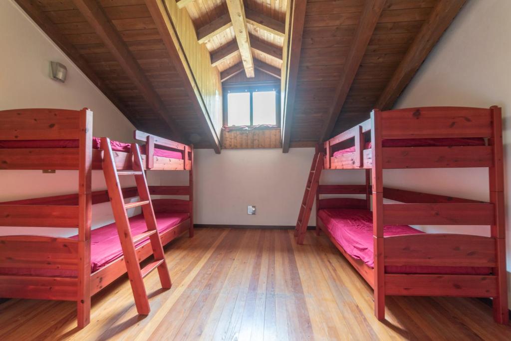 Postel nebo postele na pokoji v ubytování Rifugio Parpinasca