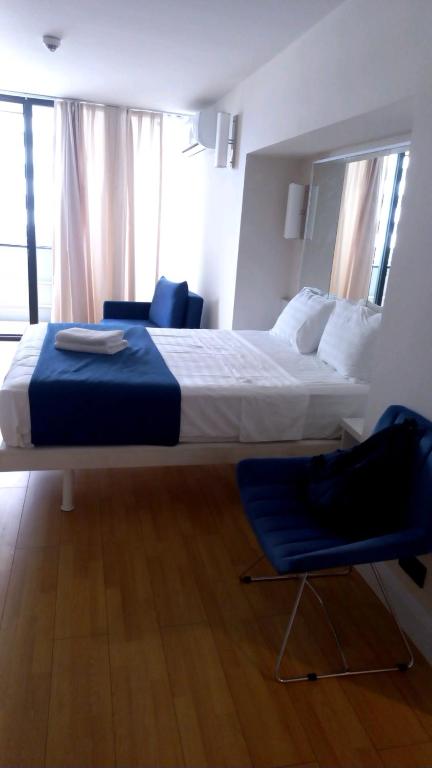 Postel nebo postele na pokoji v ubytování Lamar hotel