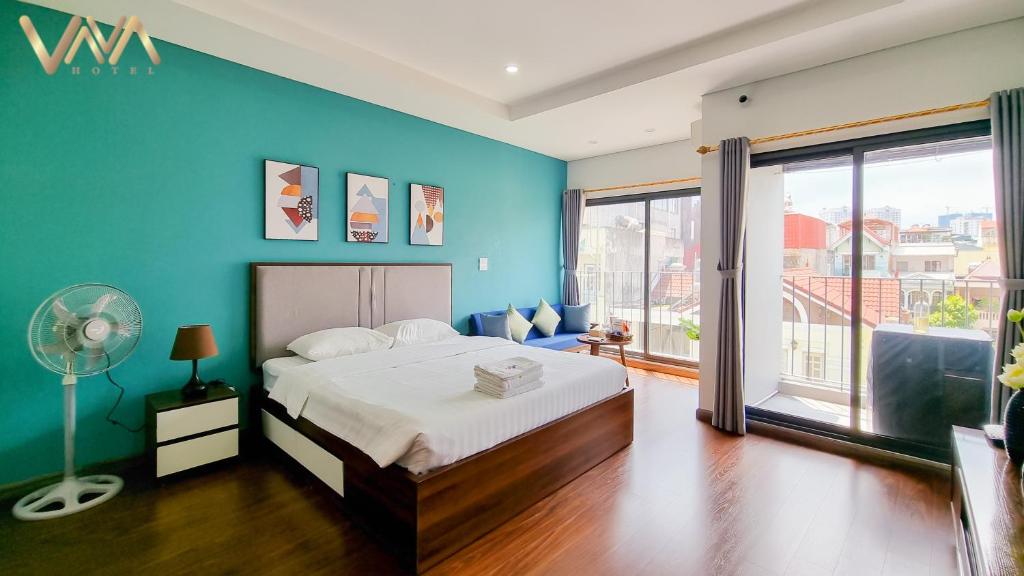 Postel nebo postele na pokoji v ubytování VNAHOMES Serviced Apartment