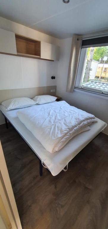 Posteľ alebo postele v izbe v ubytovaní MH 6 personnes au calme Bois Dormant 4*