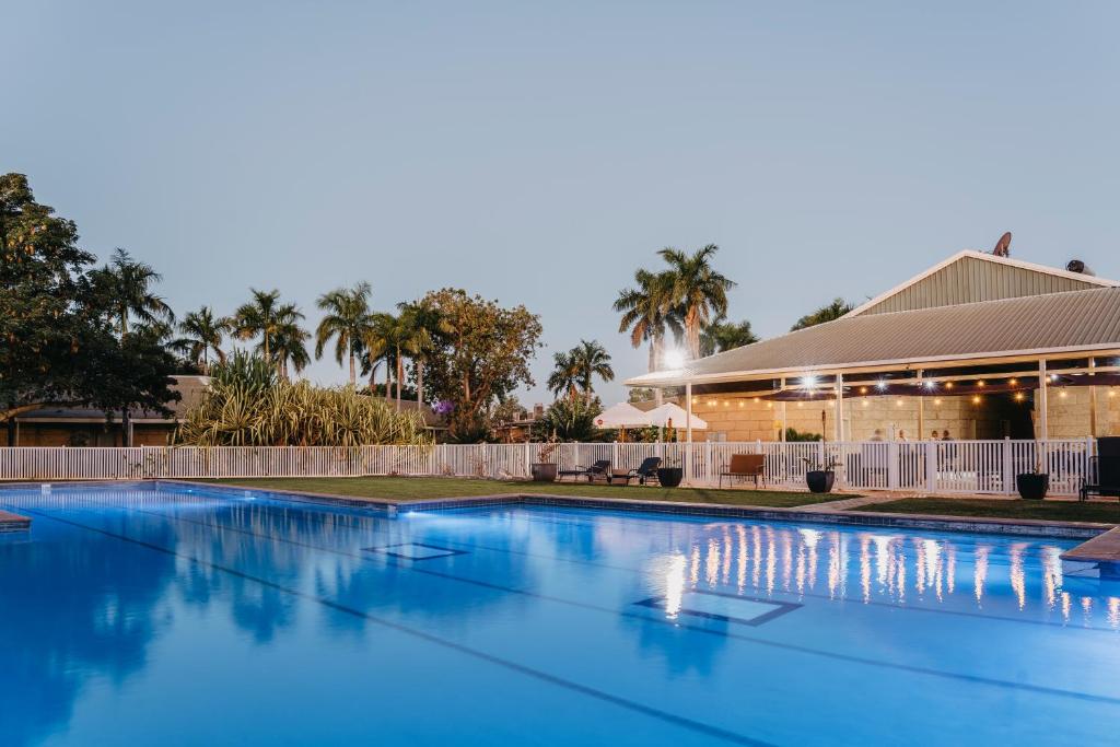 a large swimming pool in front of a building at The Kimberley Grande Resort in Kununurra