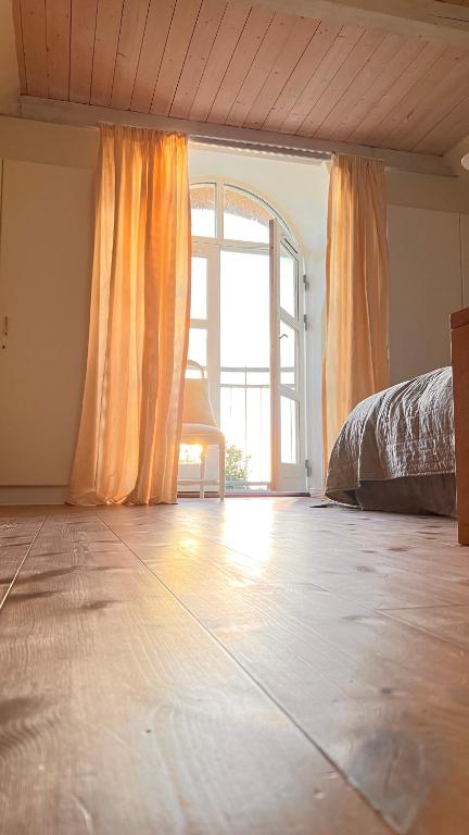 Postel nebo postele na pokoji v ubytování Bakkehuset Countryhouse