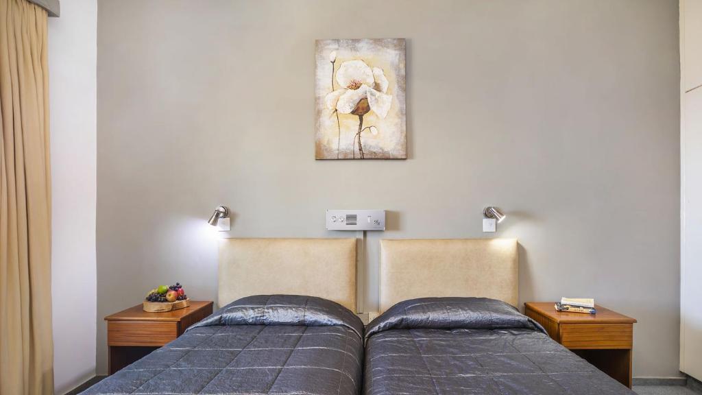 Postel nebo postele na pokoji v ubytování Troodos Hotel & Spa