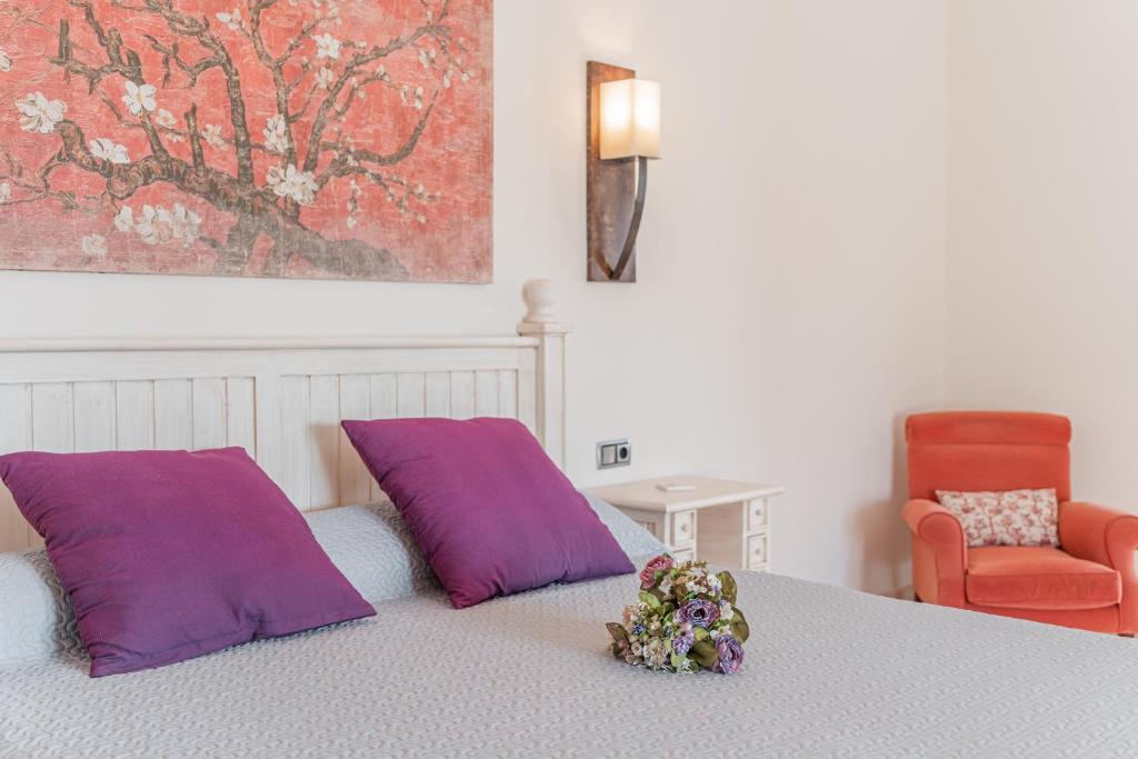 A bed or beds in a room at Eco Villa Na Clavet