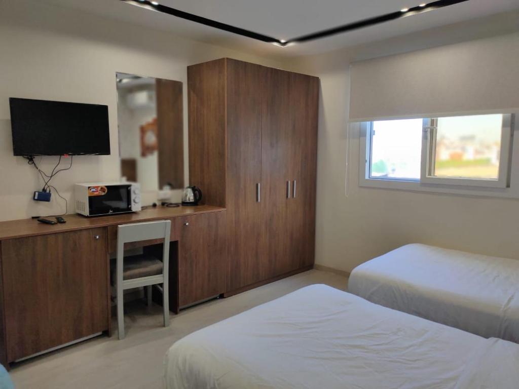 A bed or beds in a room at Hostel 390