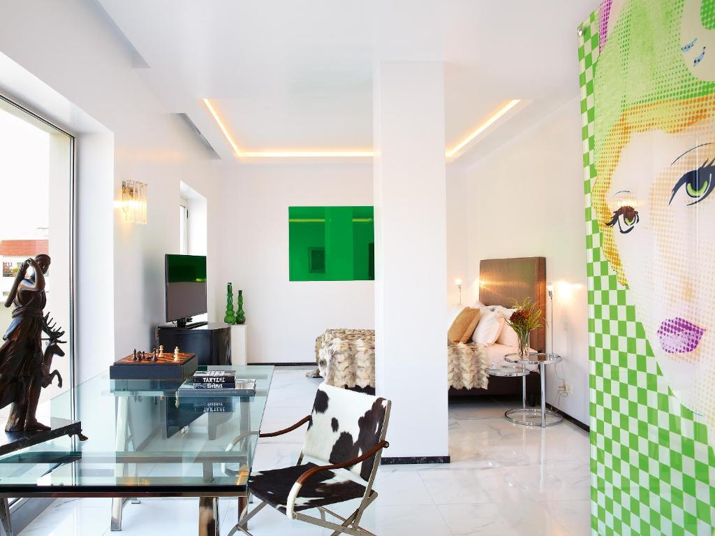 Posteľ alebo postele v izbe v ubytovaní Grecotel Pallas Athena
