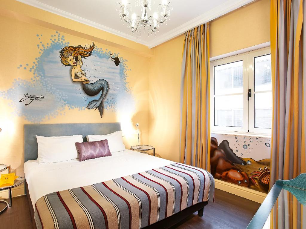 Posteľ alebo postele v izbe v ubytovaní Grecotel Pallas Athena