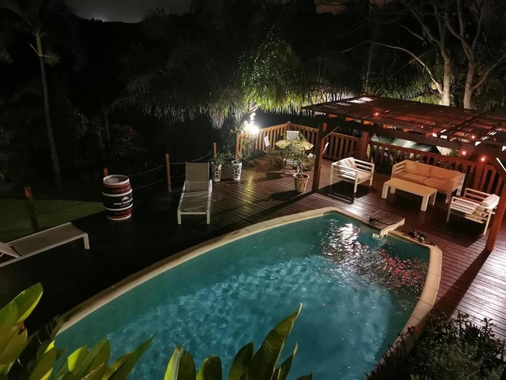 Вид на басейн у Villa de 4 chambres avec piscine privee jardin clos et wifi a Morne a l'Eau a 8 km de la plage або поблизу