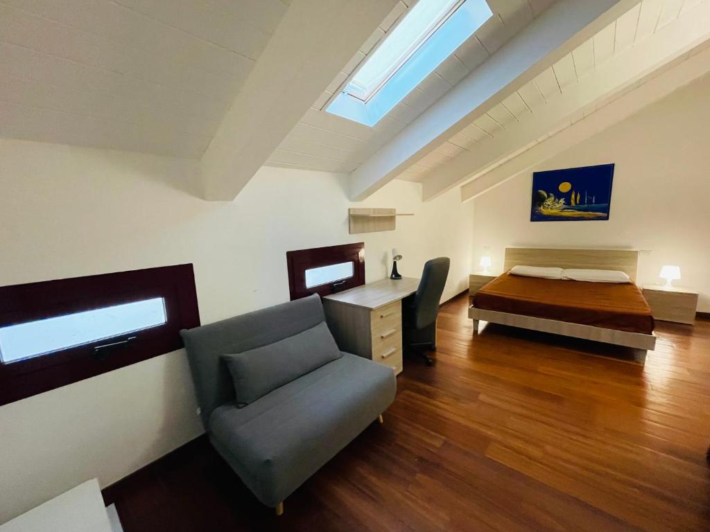 A seating area at Ego' Residence Ferrara