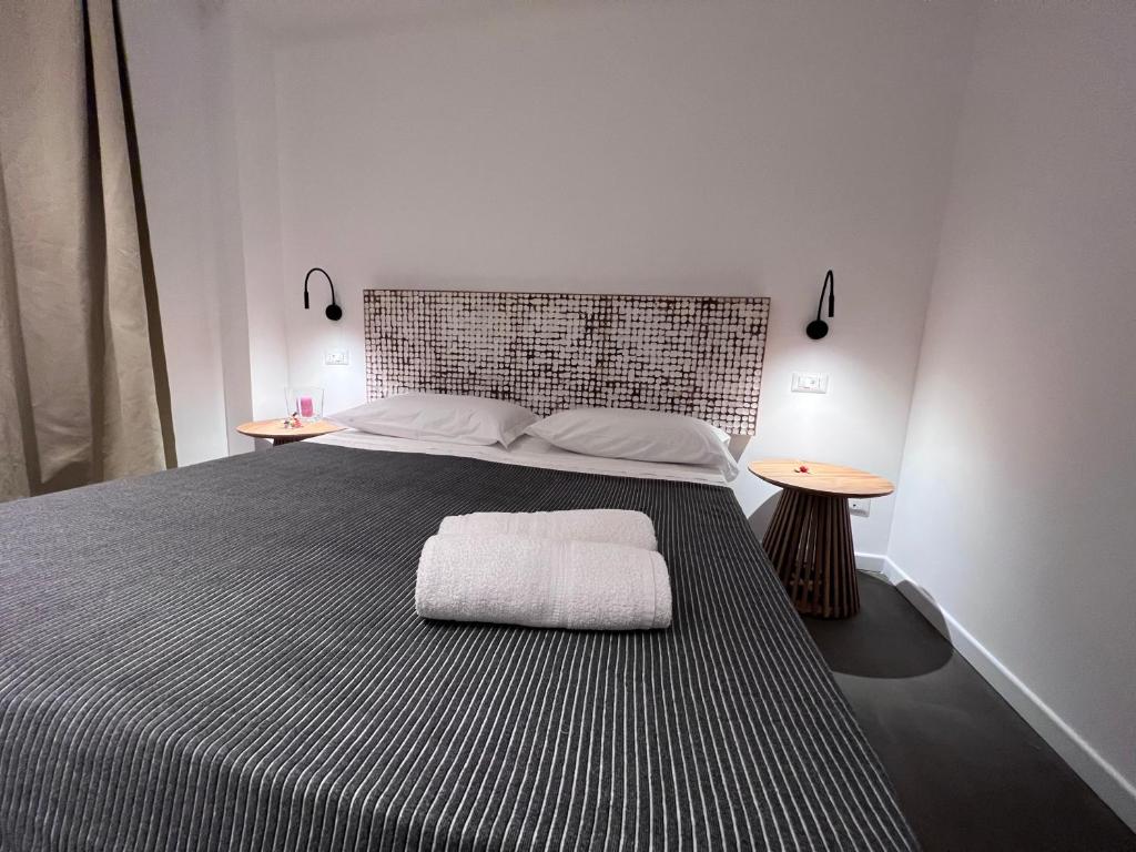 Postel nebo postele na pokoji v ubytování Villa Chiara Taormina