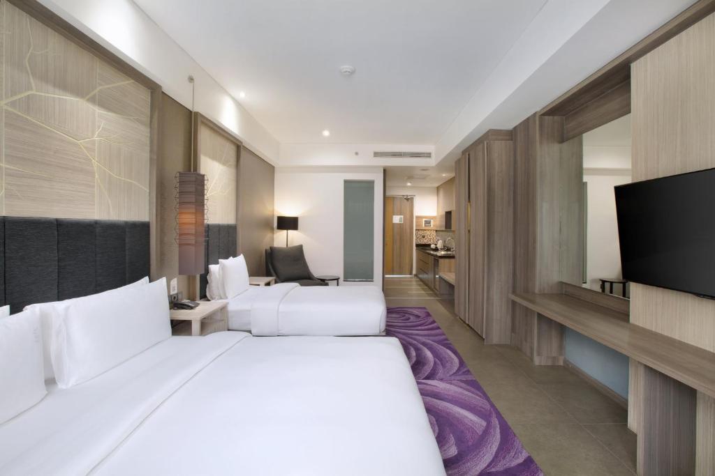 Holiday Inn Bandung Pasteur by IHG - Standard Dreibettzimmer