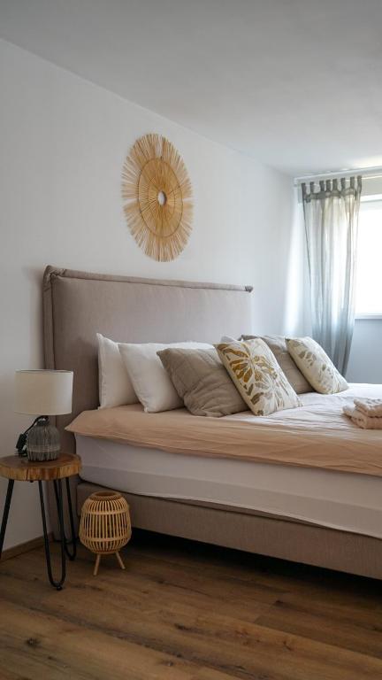 Postel nebo postele na pokoji v ubytování CASA CASSAI - Casa Milo