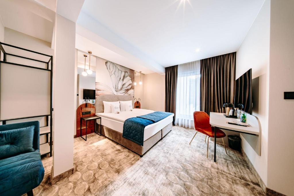 Postel nebo postele na pokoji v ubytování Hotel ETER